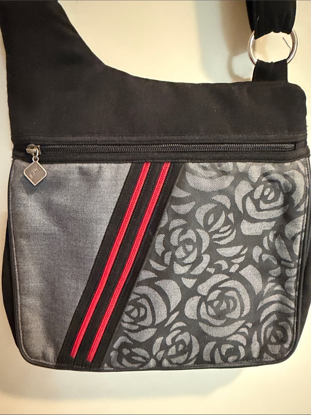 Jaks Black Messenger Bag with Gray Rose Panel and Red Stripe
